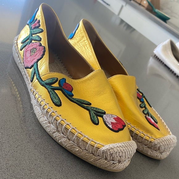 Gucci Shoes - Gold Gucci loafers w/ embroidered flowers